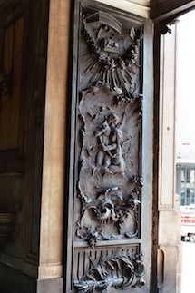 Artwork formed in metal in doorway frame